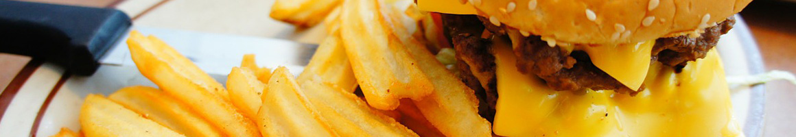 Eating Burger at Mikes Burger Grill restaurant in San Bernardino, CA.